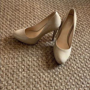 Cole Haan beige patent shoes.
